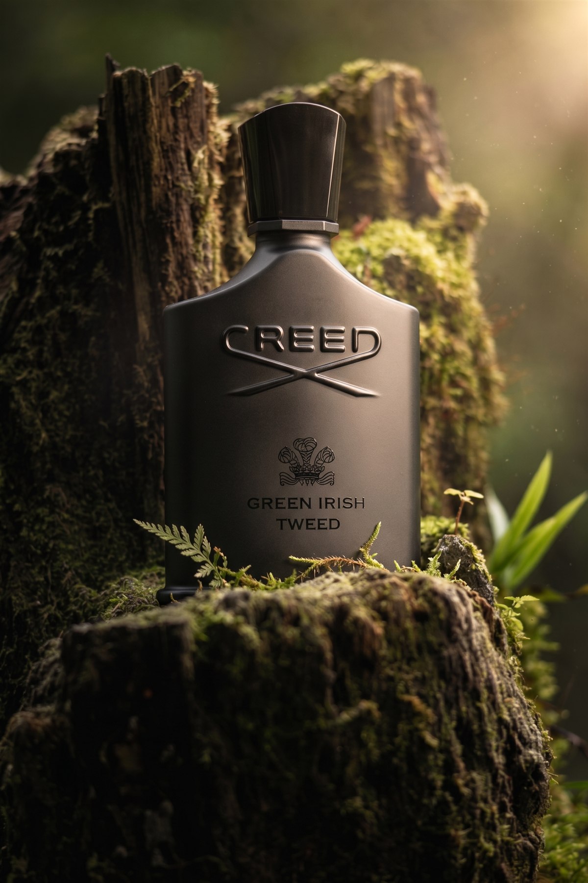 Creed Green Irish Tweed bottle in a moss-covered forest presentation