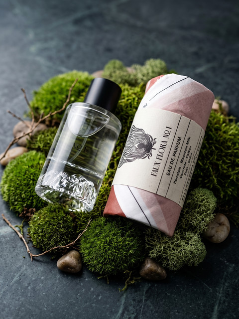 Fischersund Faux Flora No. 1 bottle and wrapped presentation arranged on green moss and stone