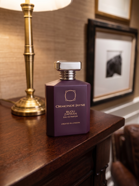 Ormonde Jayne Bijou Zafran bottle in a dark editorial presentation